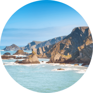 Views of the cliffs and coastline near near Hartland Quay in North Devon on a sunny day with a blue sky