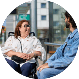 Picture of two adults sitting talking to eachother